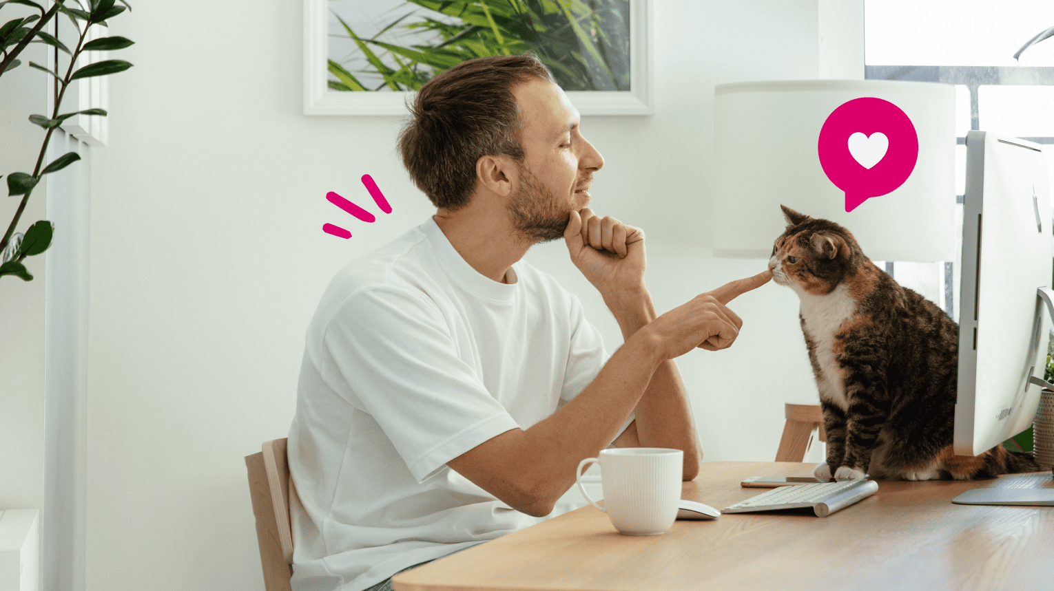 An employee playing with their pet while working from home.